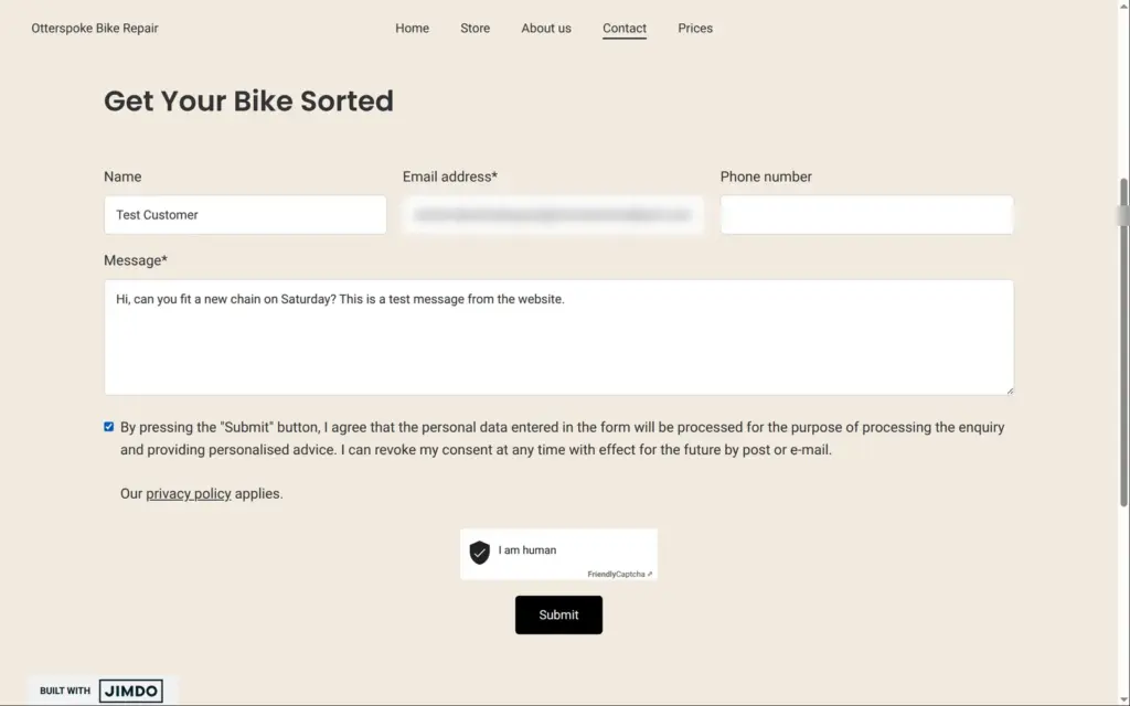 The contact form running its automatic spam check, address blurred