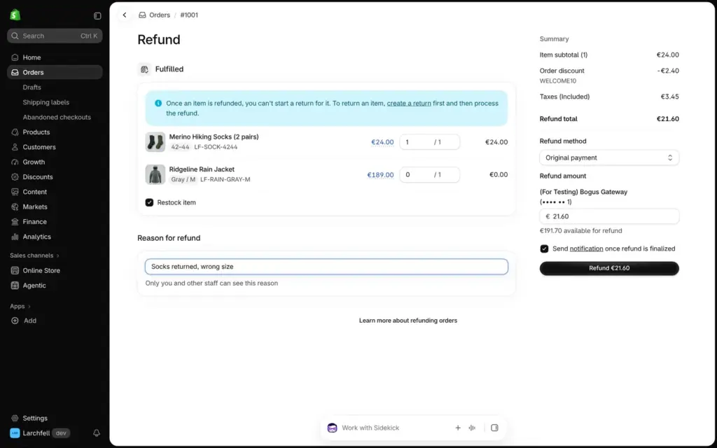 Shopify refund page with the socks selected, restock ticked and the discount share subtracted