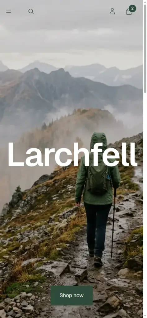 Larchfell home page on a phone with the hiker photo