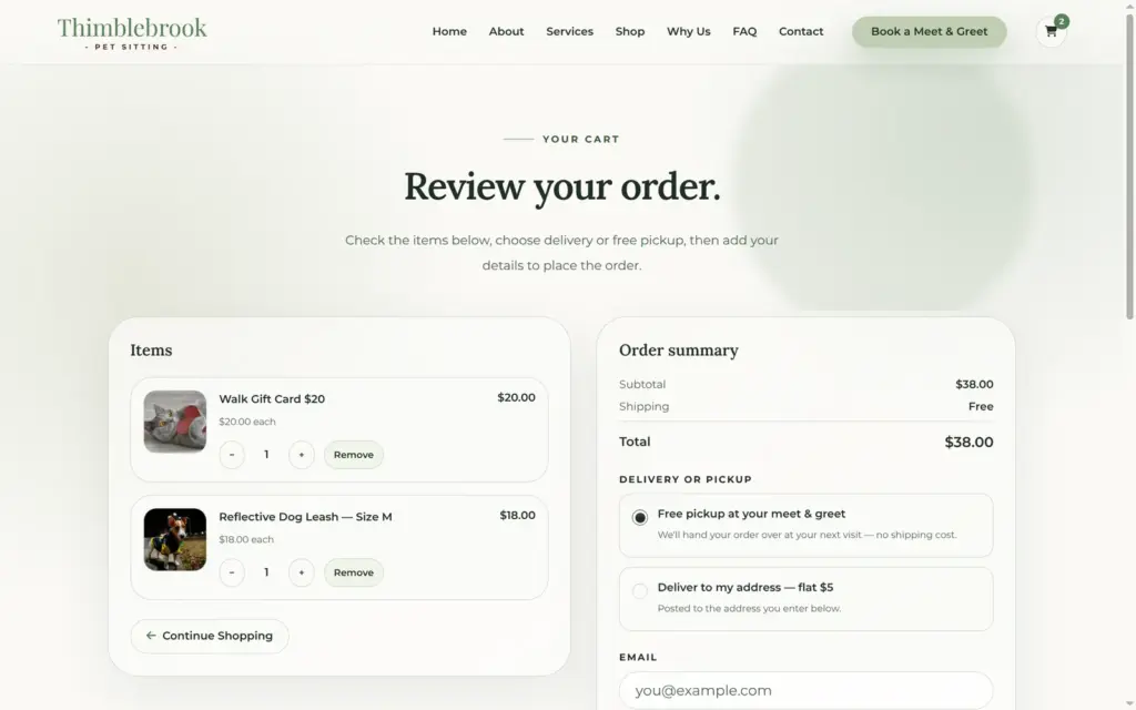 Cart on the live demo site with a gift card and a leash
