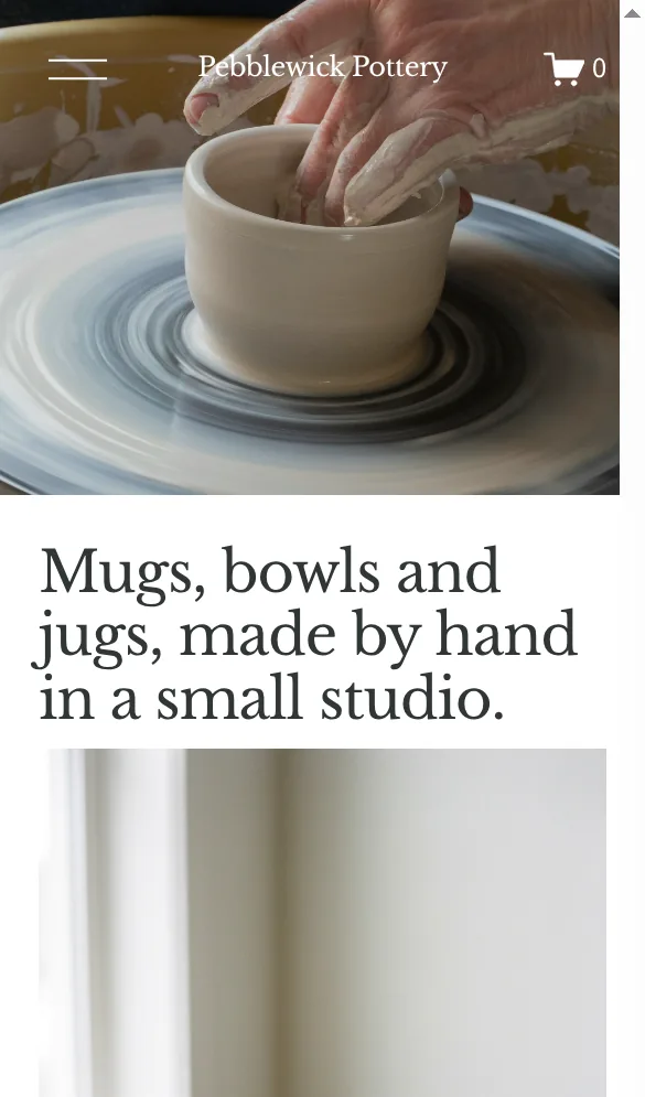 Home page of the pottery site on a phone