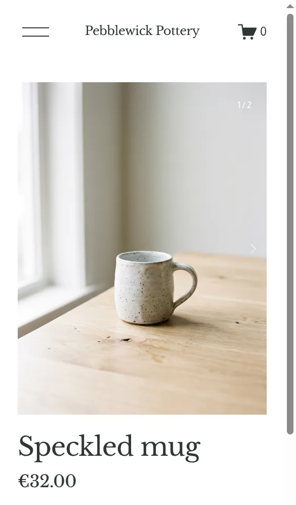 Product page of the speckled mug on a phone