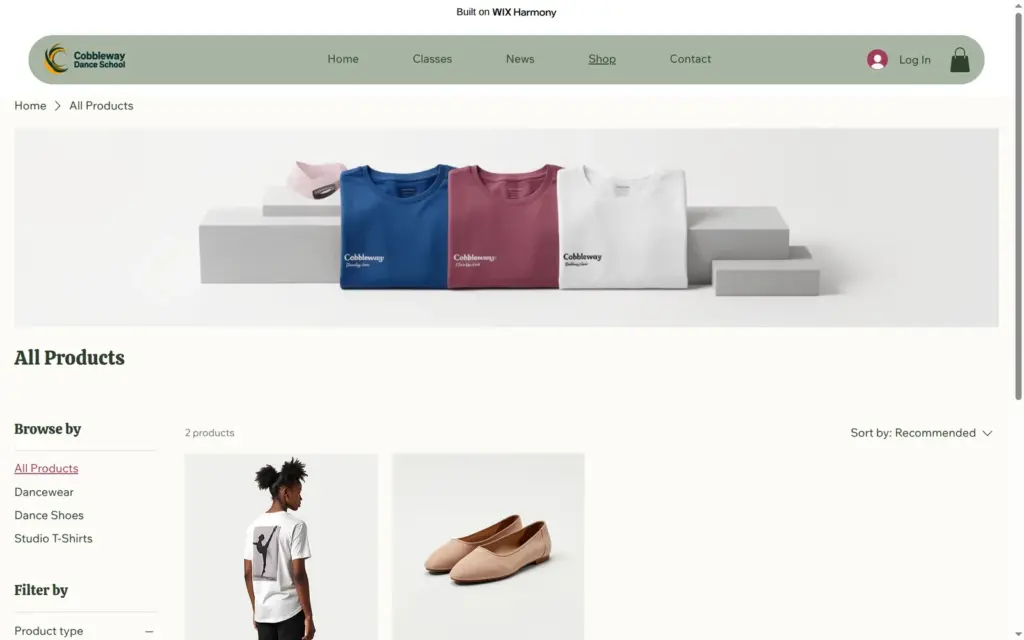 Shop page of the dance school site with a T-shirt and ballet shoes